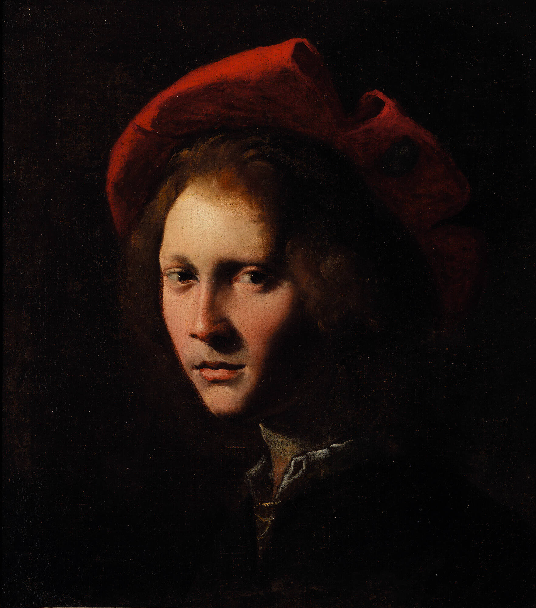 Young Man with a Red Cap